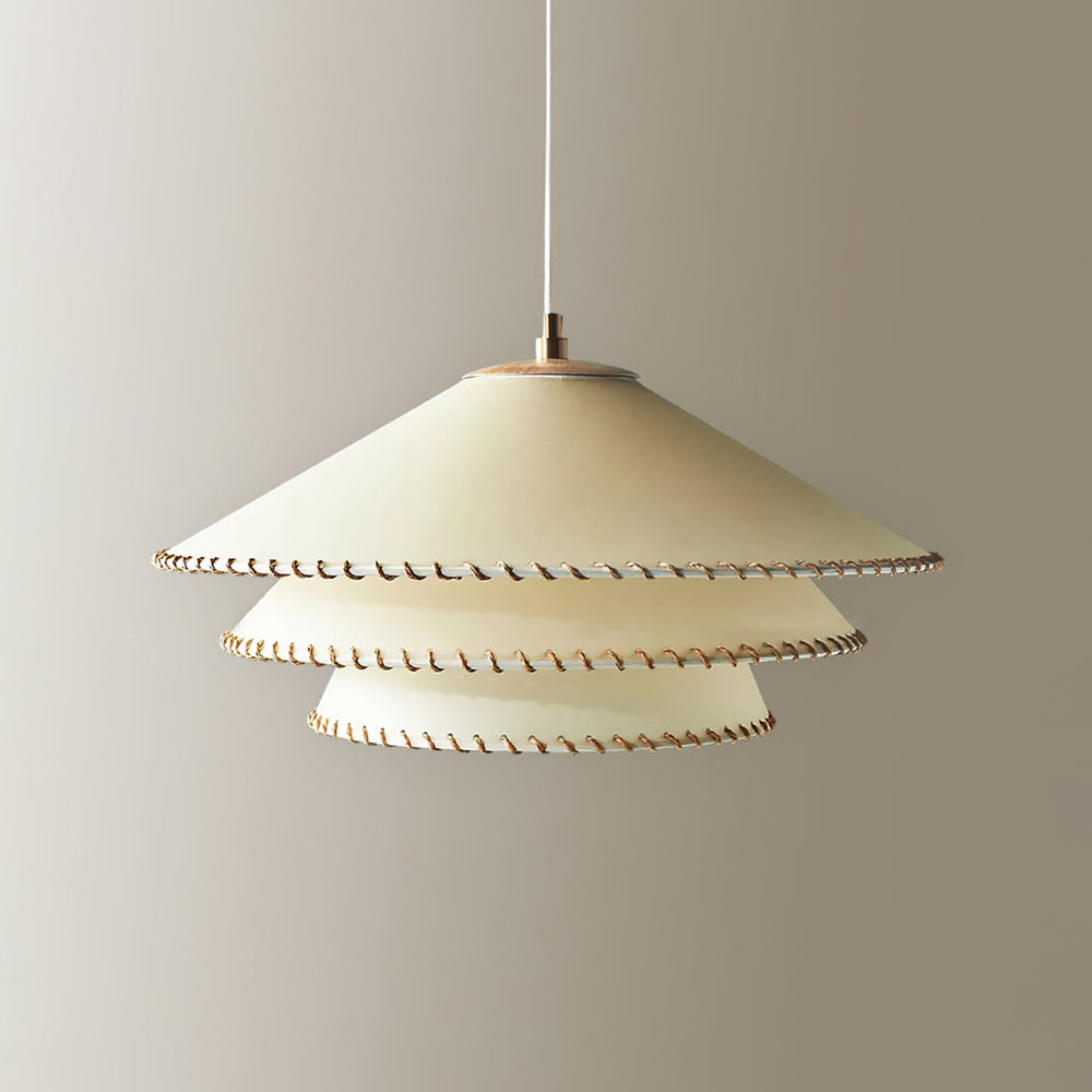 Sculptural tiered pendant, warm neutral beige, ambient glow, ideal for modern spaces.