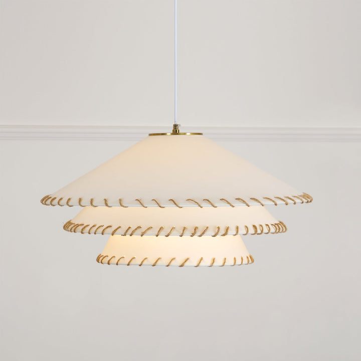 Dining room pendant light, sculptural tiered, warm neutrals, ambient glow, modern decor.