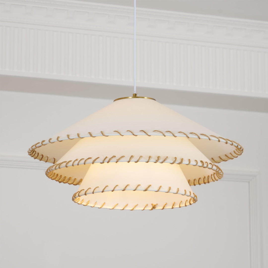 Bedroom lighting: beige sculptural tiered pendant lamp, ambient glow, bohemian style.