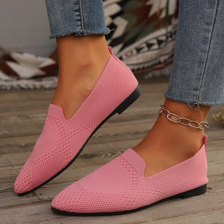 Versatile women's slip-on ballet flats with a chic pointed toe and seamless knit construction.