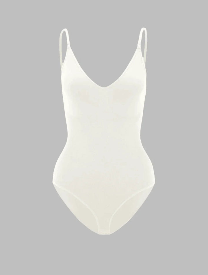 Women's seamless body shaper bodysuit for effective tummy control & natural curve smoothing.