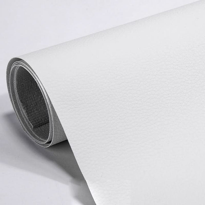 Extra-large leather repair sticker to cover significant upholstery damage.