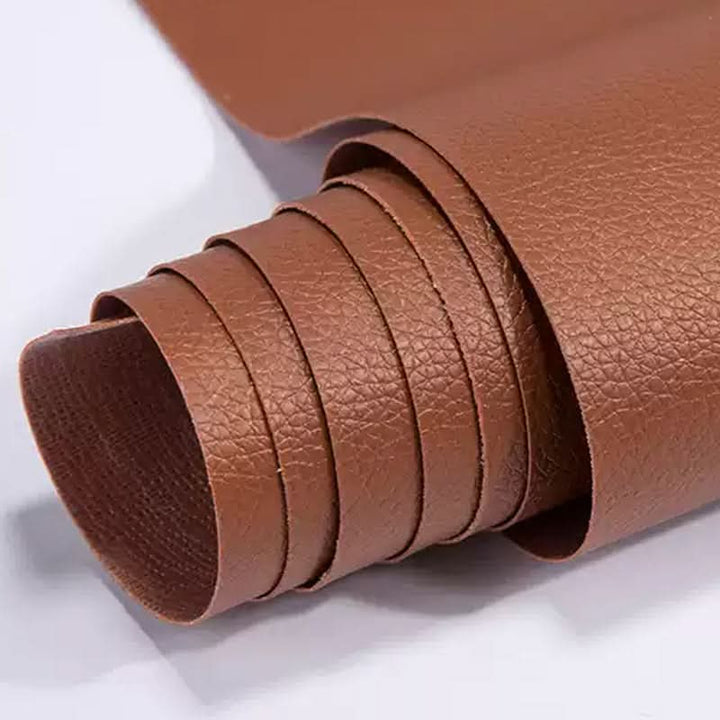 Large leather repair patch with strong adhesive for furniture and car seats.