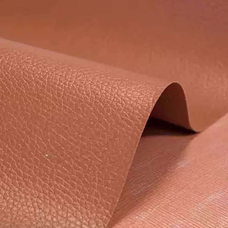 Brown faux leather repair patch, ideal for sofas, chairs, and car interiors.