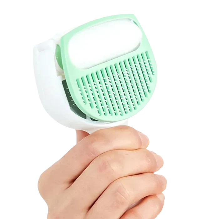 Grooming tool for dogs & cats featuring a self-cleaning function for simple hair removal.