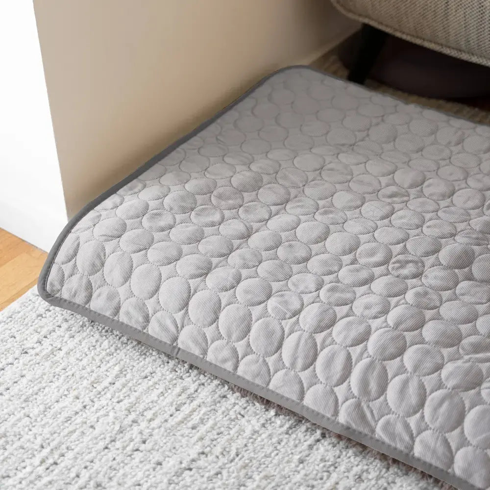 Soft, cooling pet bed for dogs. This durable, self-cooling mat provides summer comfort & heat relief for any animal.
