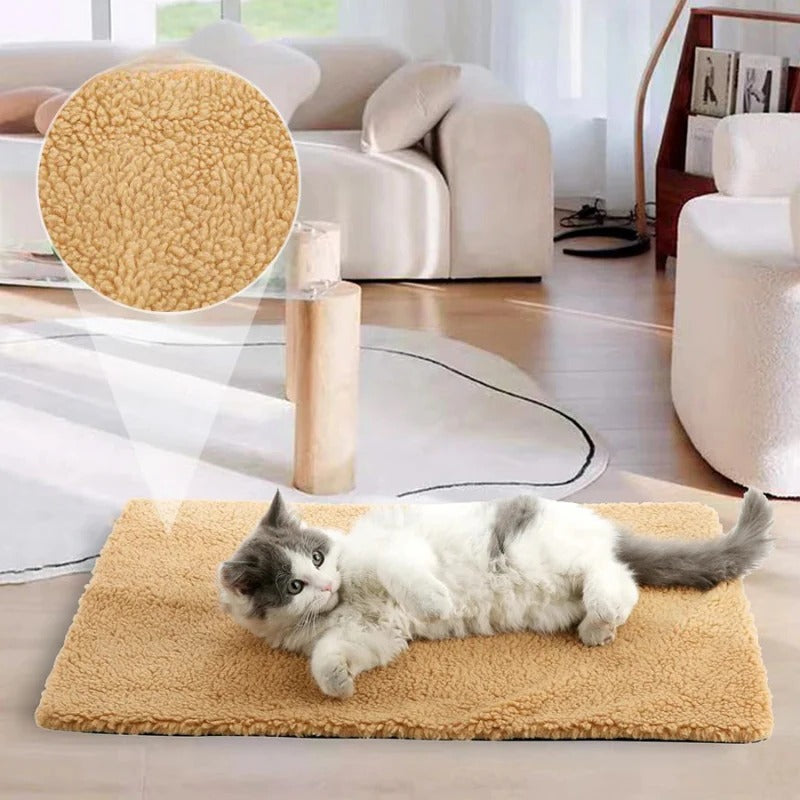 Self-heating pet mat for cats and dogs providing cozy warmth without electricity.