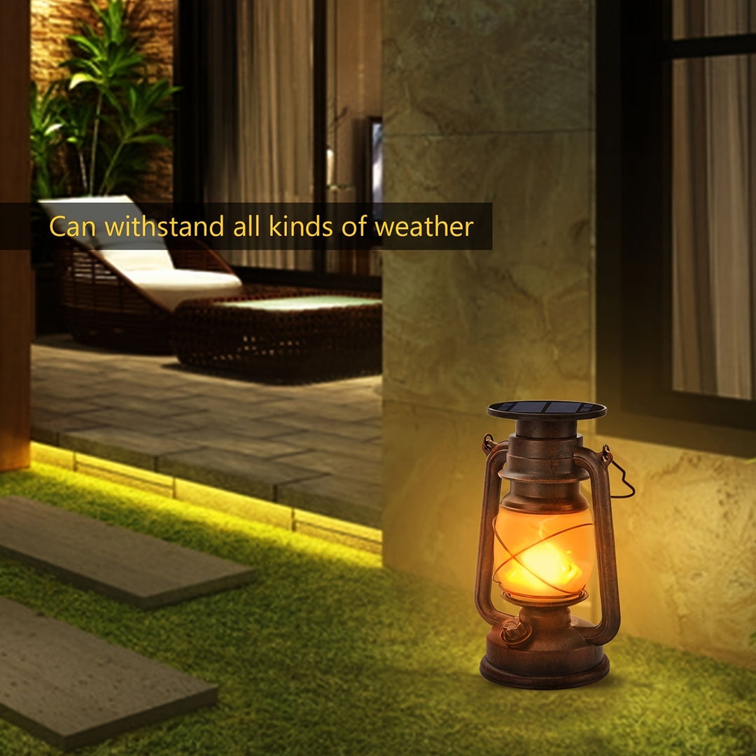 Outdoor solar garden lanterns, a set of 2 vintage style with mesmerizing dancing flame LED lights for patio ambiance.