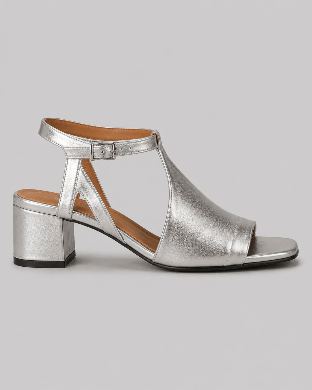 Shimmering silver block heel sandals for women, perfect for elegant parties & formal summer events.