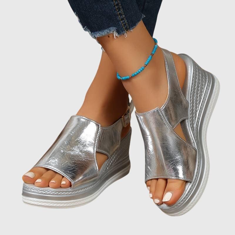Supportive, shiny women's orthopedic sandals. Comfort footwear with slip-resistant design, ideal for elegant summer fashion.
