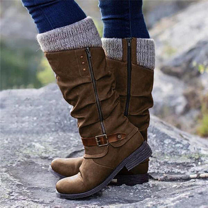 Close-up of warm women's winter boots. Features cozy lining, orthopedic arch support & waterproof protection.