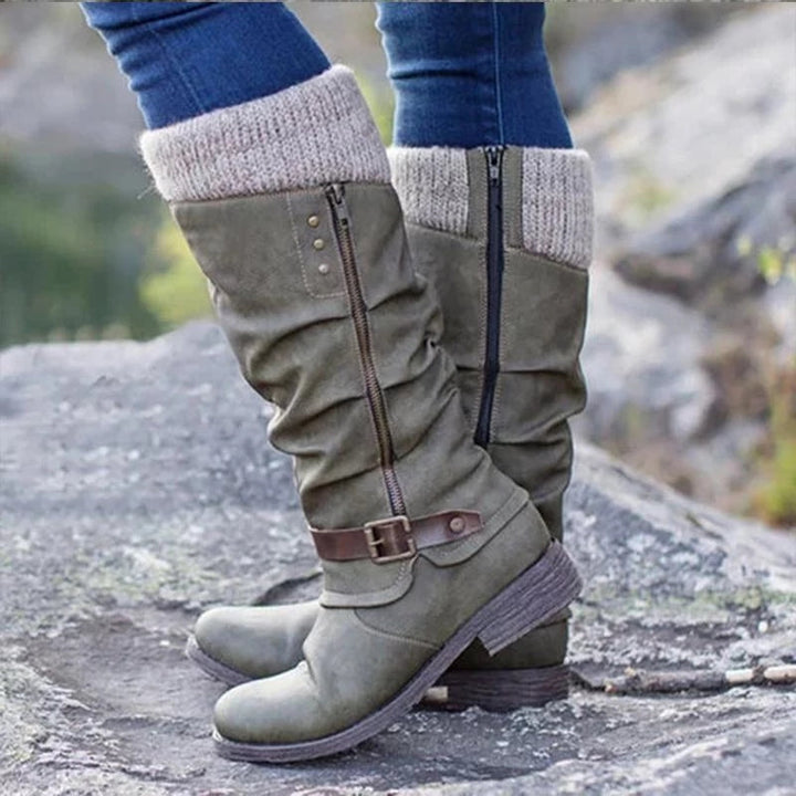 Stylish mid-calf women's orthopedic winter boots, perfect for snow. Slip-resistant soles & arch support ensure warmth & safety.