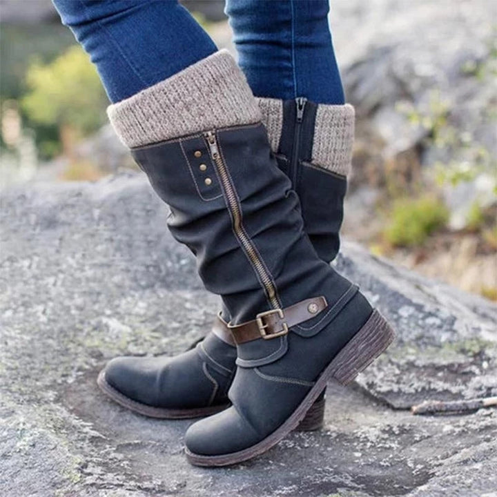 Women's waterproof winter boots with robust mid-calf design & orthopedic arch support for all-day comfort on cold days.