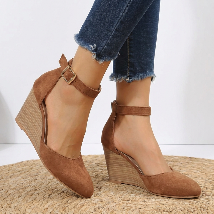 Close-up of Siena wedge heels showcasing the stylish pointed toe and secure ankle strap.