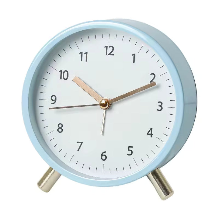 Silent minimalist table clock in Scandinavian design, perfect for peaceful homes.
