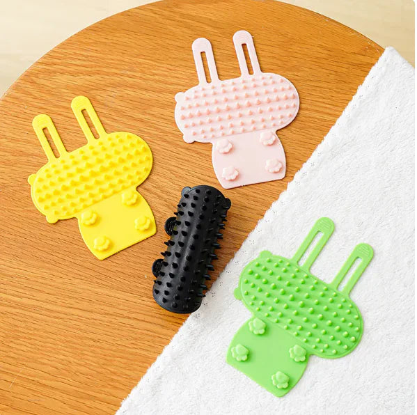 Multi-color silicone cat brush for pet care & itch relief. Durable cat scratcher for feline grooming comfort.
