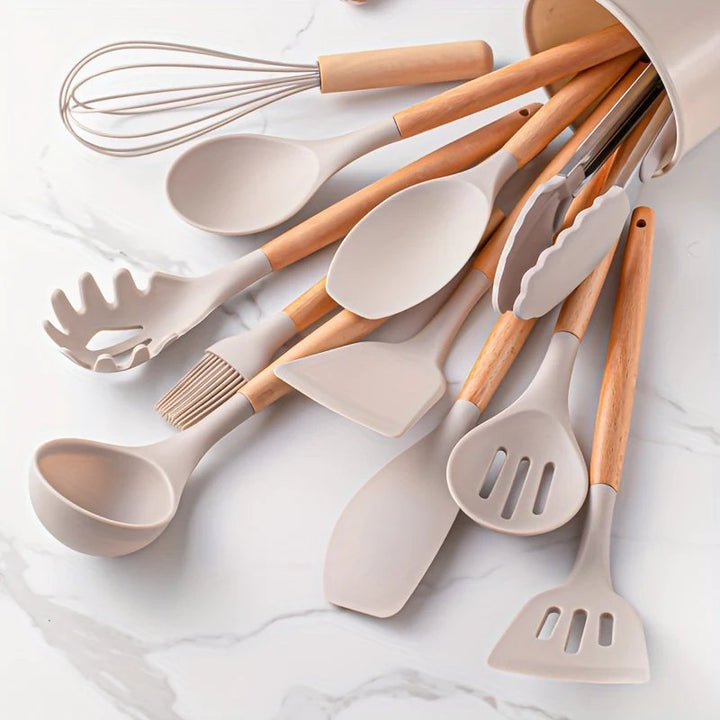 Silicone kitchen utensil set with wooden handles, non-stick & heat resistant. BPA-free cooking tools.