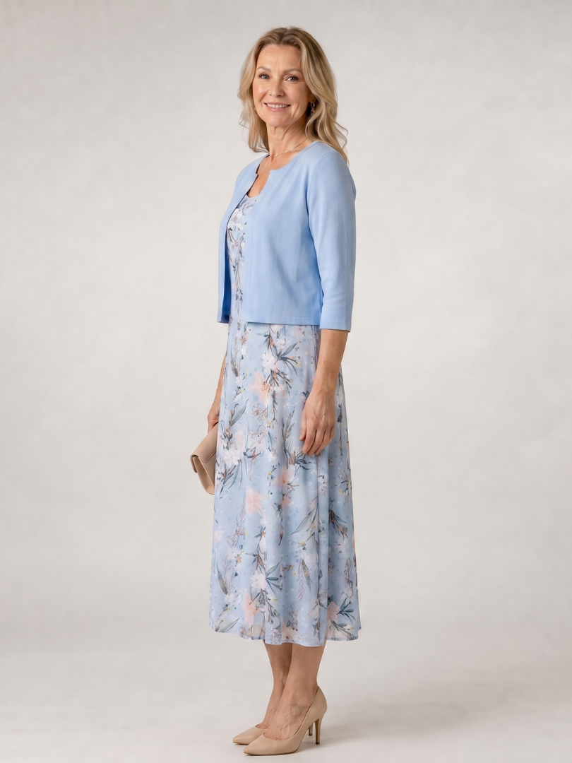 Women's casual sky blue floral midi dress with a chic cropped jacket. Perfect layered look for spring/summer comfort.