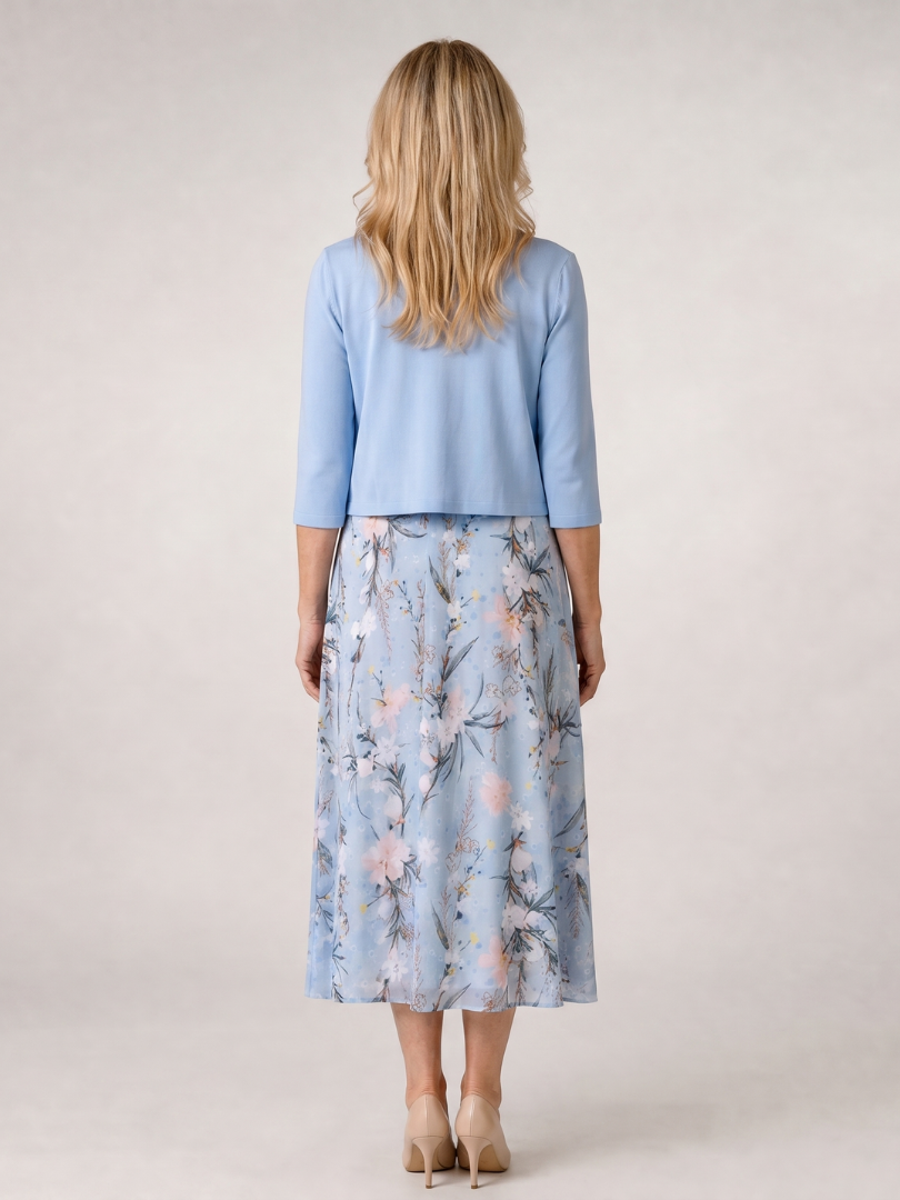 Vibrant floral print sleeveless midi dress & cropped jacket. Women's stylish two-piece set, great for spring/summer fashion.