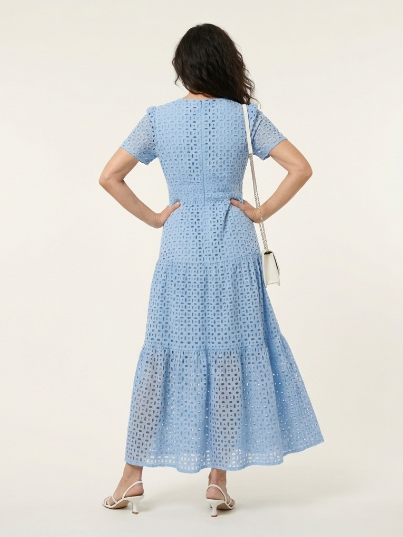 Women's stylish sky blue tiered midi dress, V-neck, short sleeves, smocked waist for summer.
