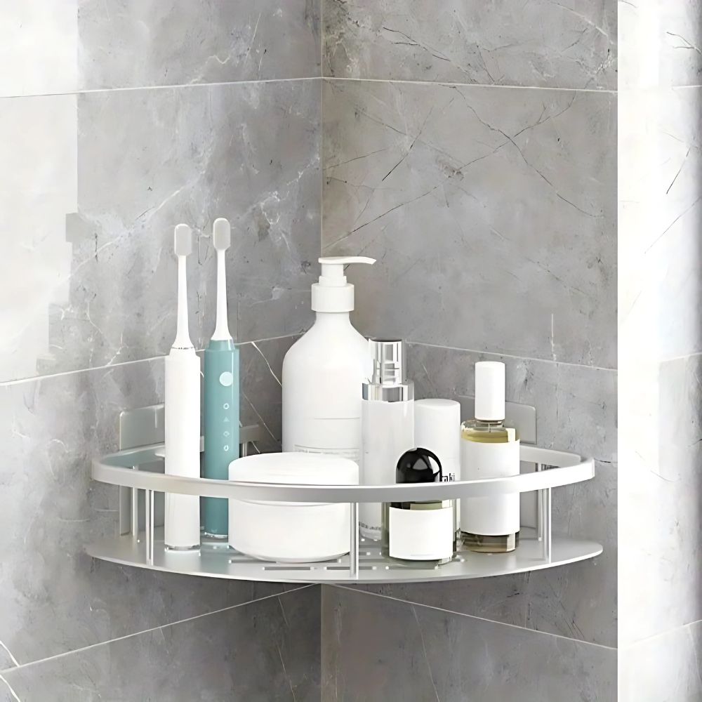 Wall-mounted 1-tier rustproof bathroom organizer shelf, offering modern silver and black decor.