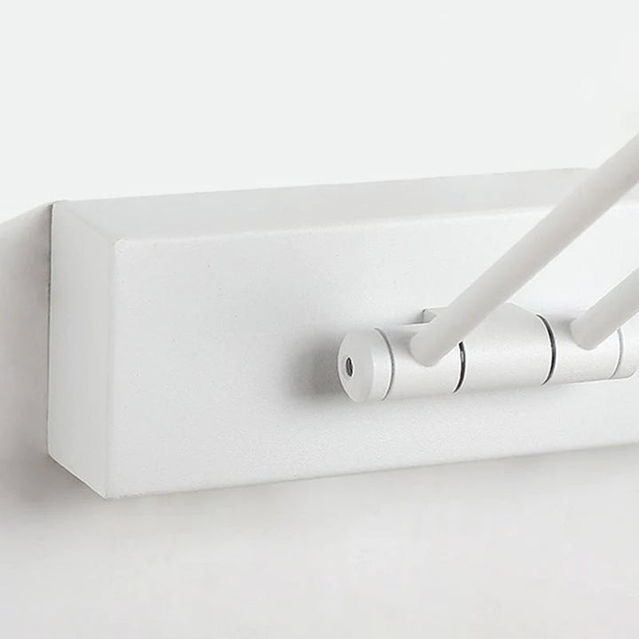 Modern linear LED adjustable lamp for targeted wall illumination.