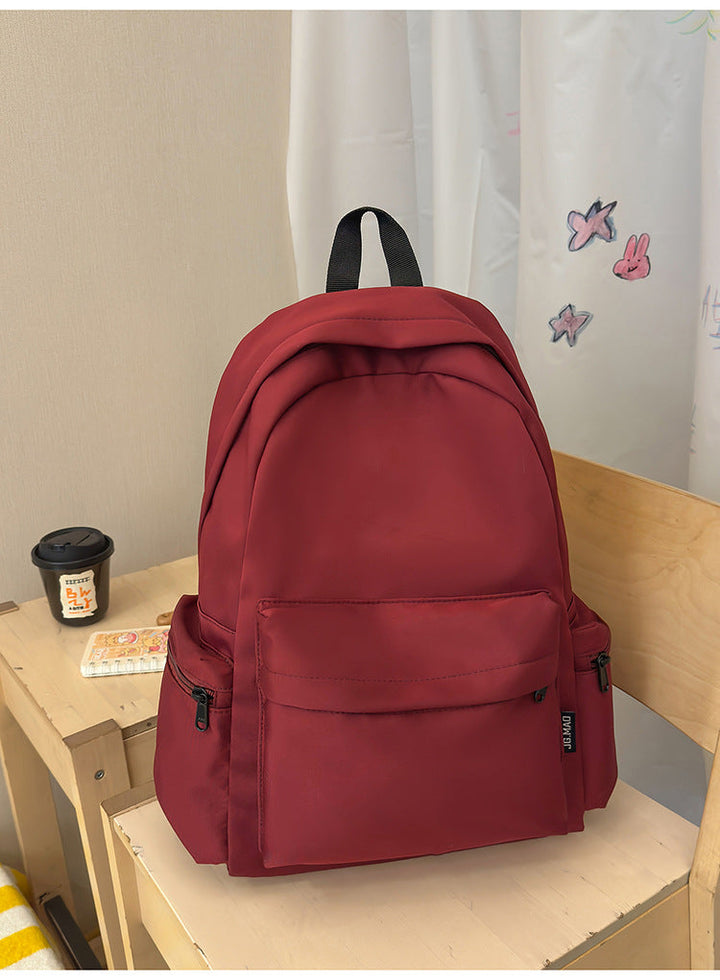Unisex minimalist backpack for school, office, or travel. Sleek, functional design ensures comfortable daily commute.