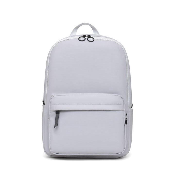 Modern gray textured unisex laptop backpack. Durable school, work, or travel bag for 15-inch laptops.