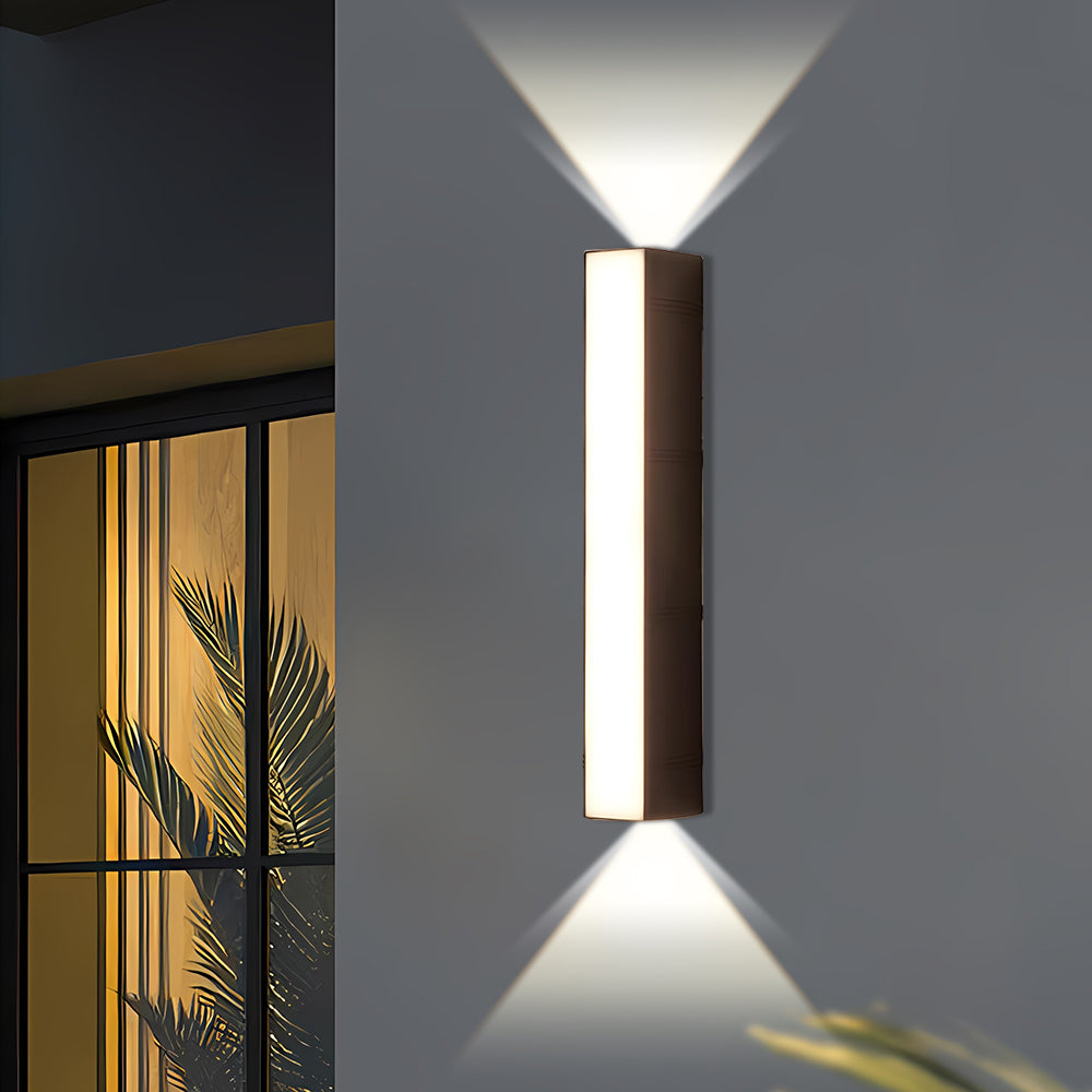 Waterproof LED wall fixture, contemporary design for outdoor decor.