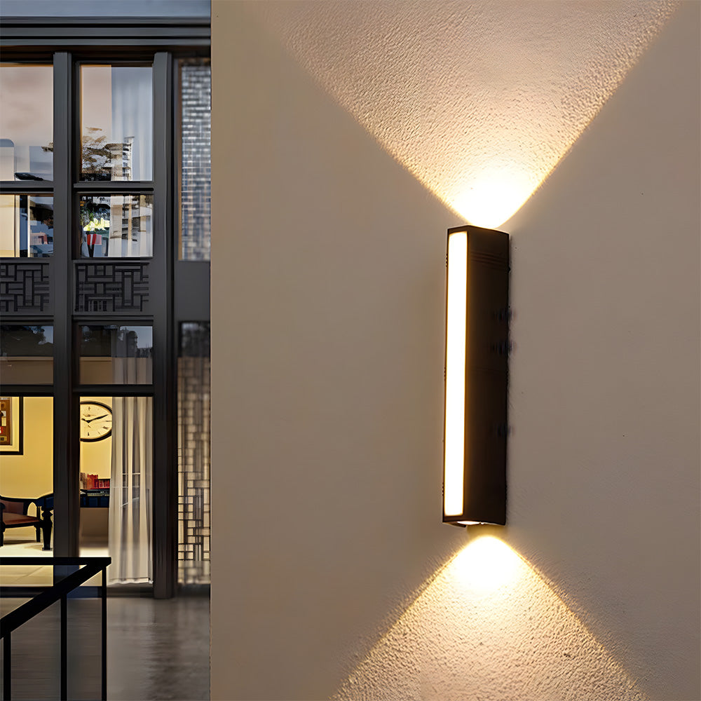 Contemporary LED wall sconce for modern outdoor landscape lighting.