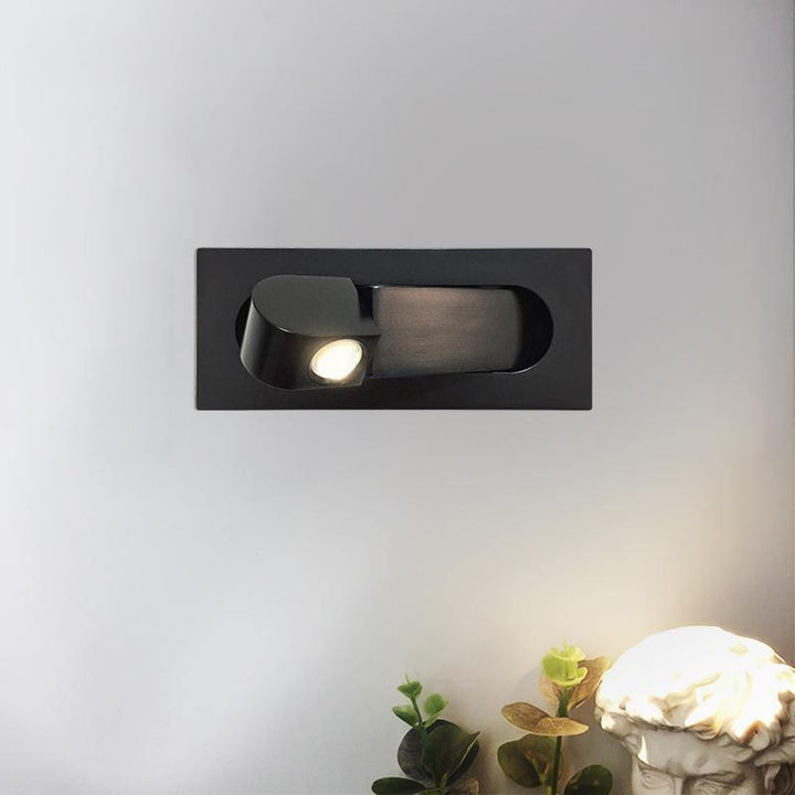 Sleek LED wall lamp, adjustable for bedside reading, modern bedroom decor.