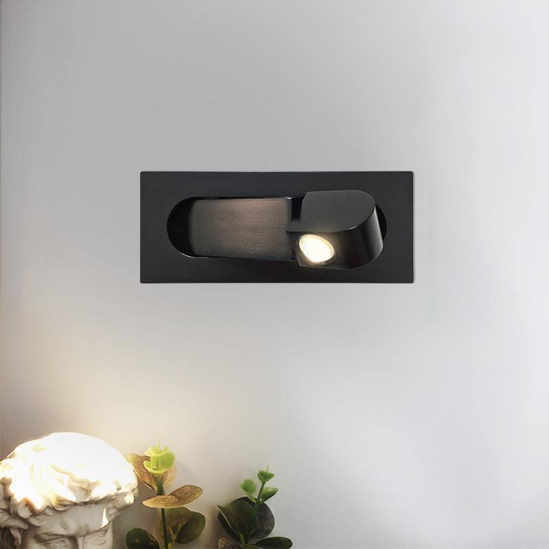 Contemporary wall-mounted LED lamp, sleek design, ideal for bedside & accent lighting.
