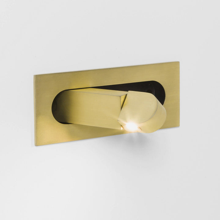 Adjustable LED bedside wall lamp, modern lighting solution with sleek aesthetics.