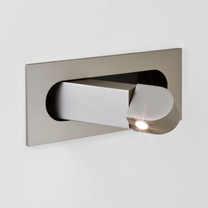 Energy-efficient LED wall lamp, sleek adjustable design for contemporary bedrooms.