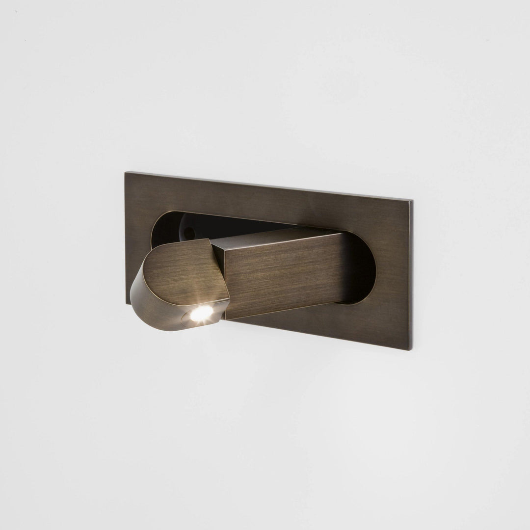 Contemporary sleek LED wall lamp, perfect for focused reading and bedroom ambiance.