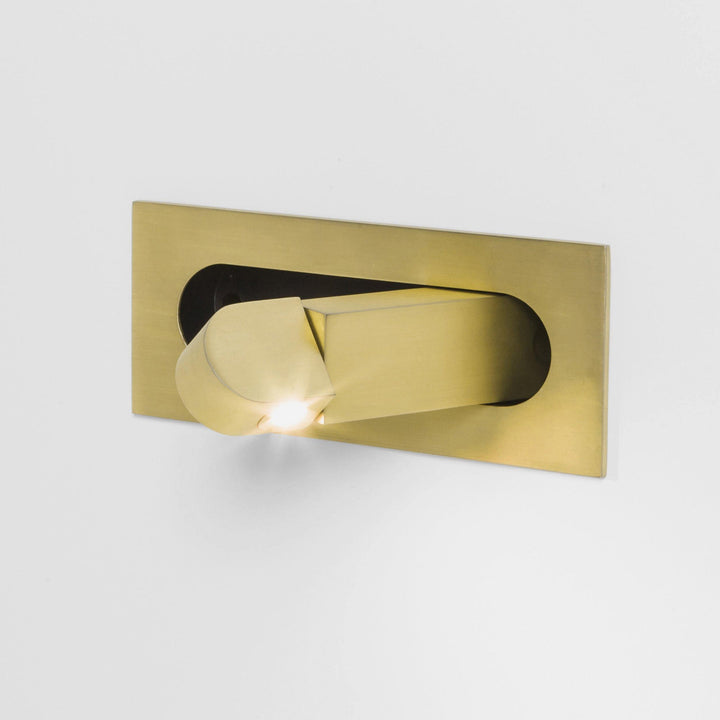 Energy-efficient LED bedside lamp, sleek adjustable wall light for focused reading.