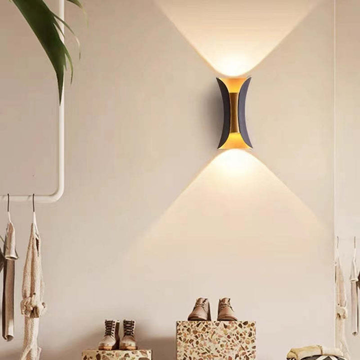 Black modern LED outdoor wall light, durable & weather-resistant for any exterior.