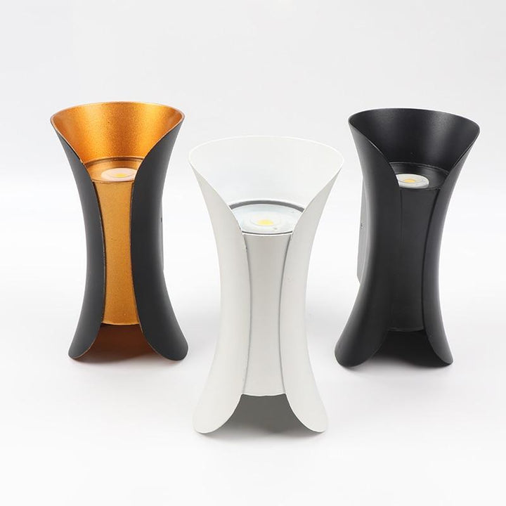 Stylish modern LED outdoor wall lamp, IP65 rated for beautiful exterior home decor.