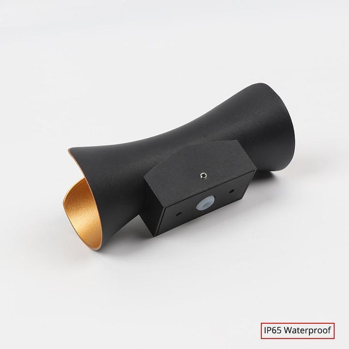 Modern LED outdoor wall light providing stylish accent lighting for gardens & patios.