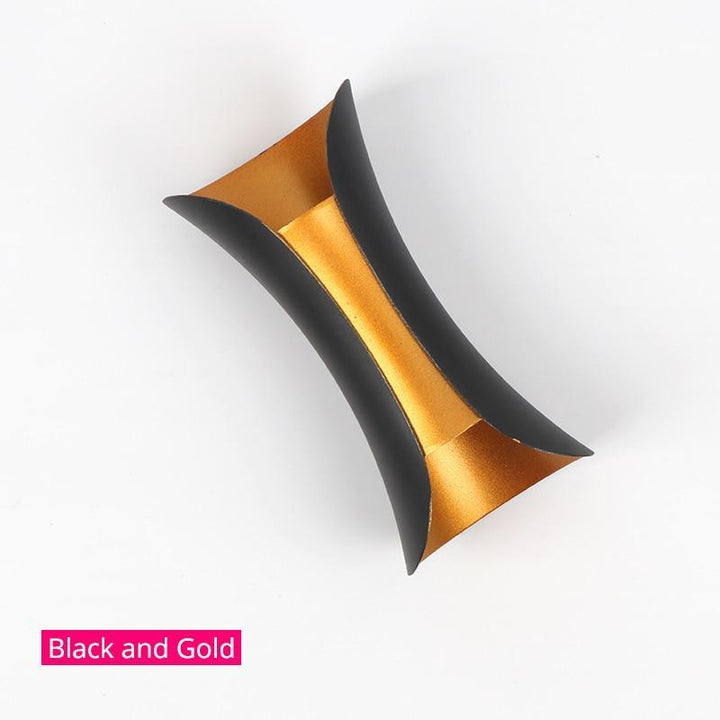 Sleek modern LED wall light, ideal for architectural exterior lighting projects.