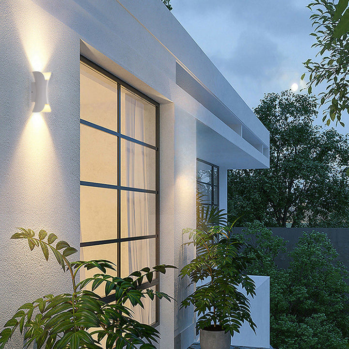 Modern outdoor LED wall light with a sleek design, perfect for durable exterior lighting.