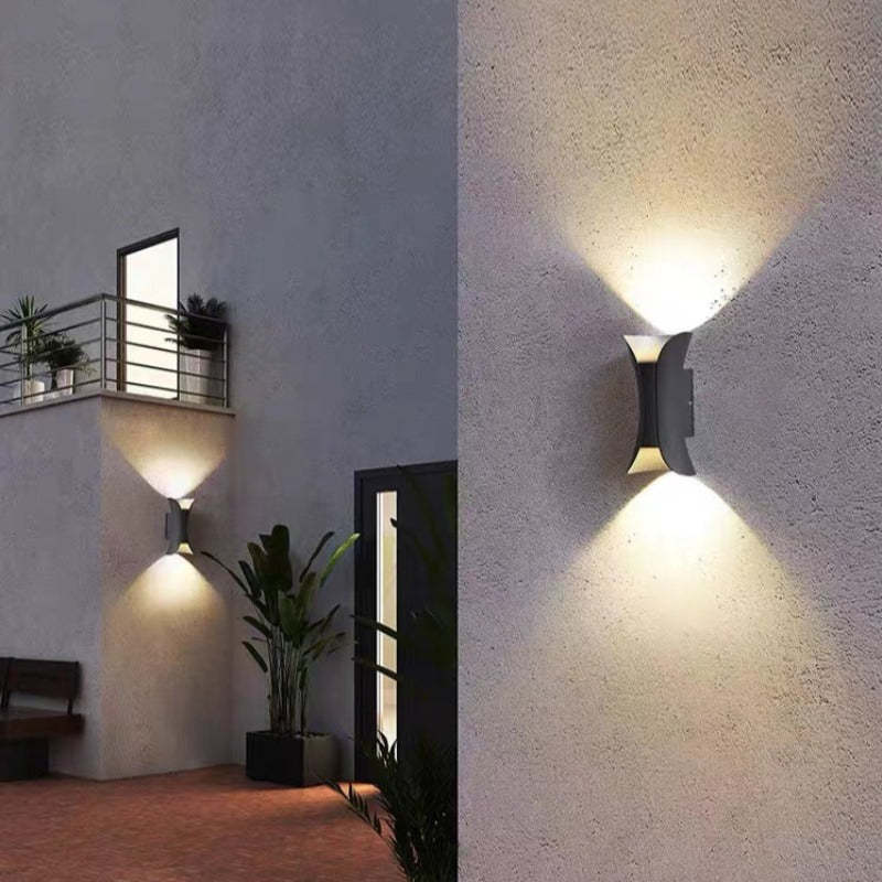 Modern black LED outdoor wall light, energy-efficient & sleek design for home decor.