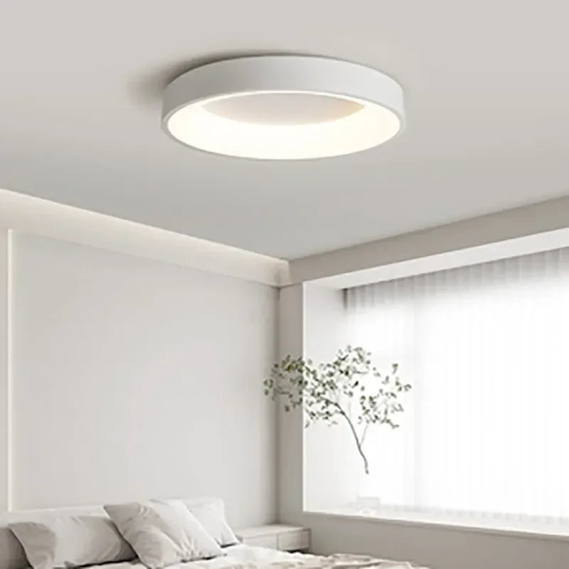 Sleek Modern Nordic LED Ceiling Light, round & energy-efficient, perfect for minimalist bedroom or living room decor.