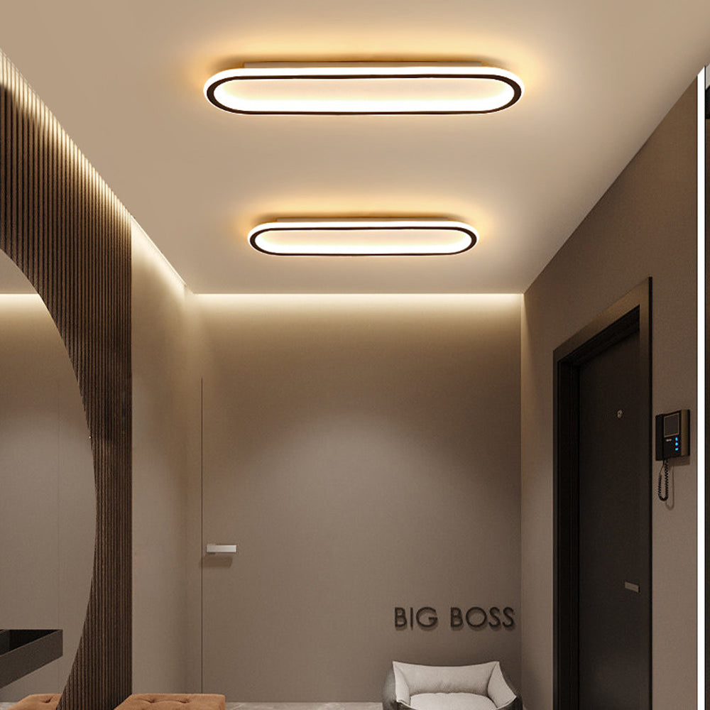 Rose gold finish oval flush mount ceiling light, a sleek choice for contemporary homes.