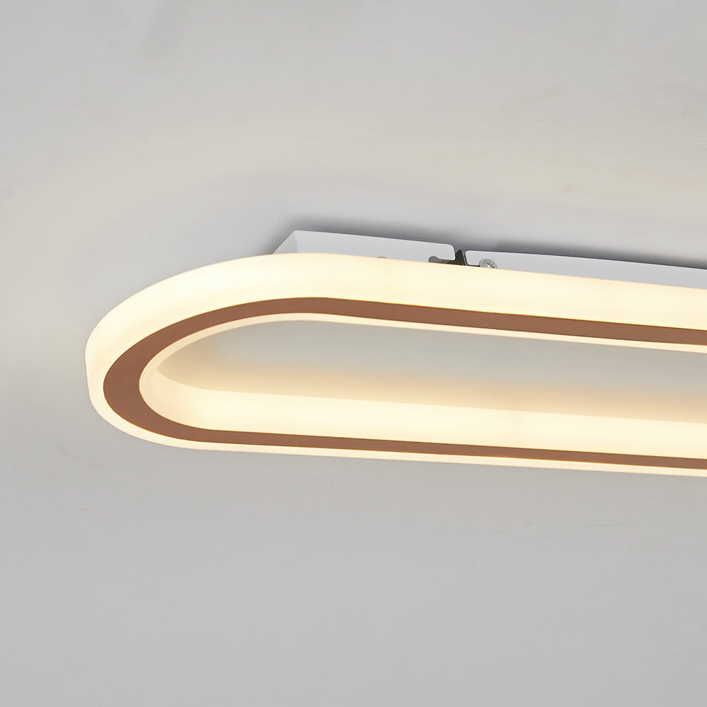 Adjustable LED oval flush mount ceiling light, perfect for modern home lighting needs.