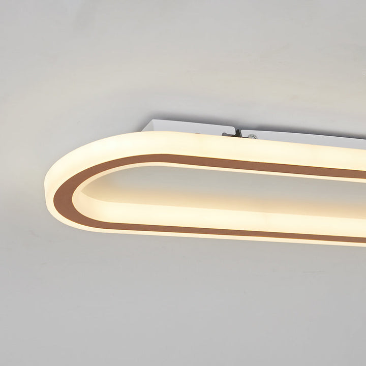Adjustable LED oval flush mount ceiling light, perfect for modern home lighting needs.