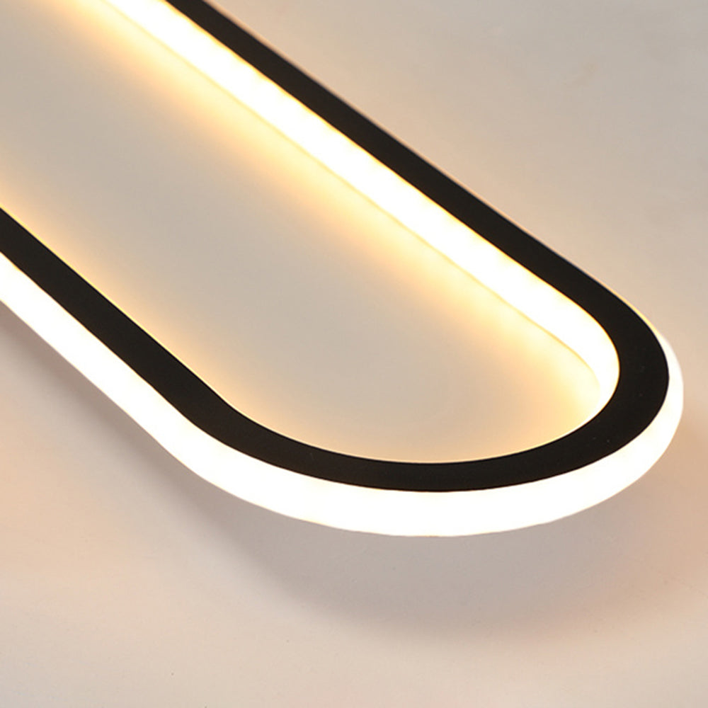 Gold oval flush mount ceiling light with LED, bringing contemporary design to homes.