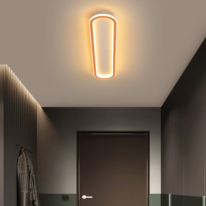 Black oval LED flush mount ceiling light, ideal for contemporary home illumination.