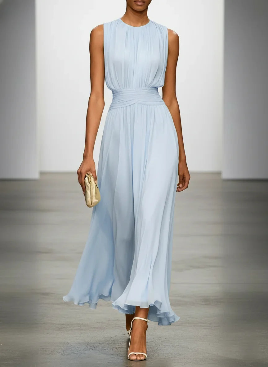 Sleeveless light blue chiffon A-line maxi dress for wedding guests.
