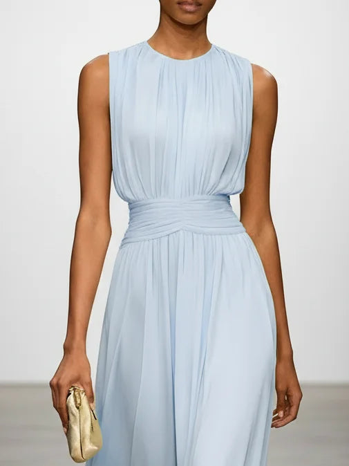 Chiffon sleeveless maxi dress in light blue, perfect for summer events.